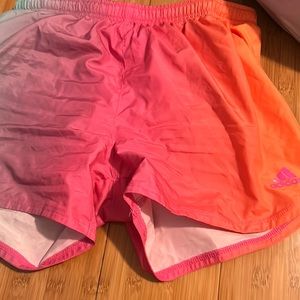 Active wear shorts from Adidas, orange, pink, blue, purple ish